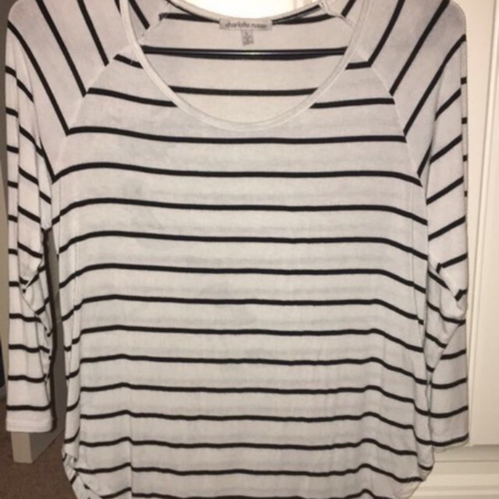 Navy blue/white striped quarter length shirt.